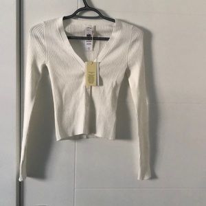 A button front New Manila cardigan from Aritzia, Wilfred the colour light birch.